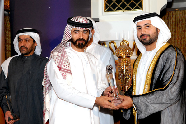 Sheikh Maktoum Bin Hasher Al Maktoum,CEO, Al Fajer Group awarded Mr. Omar Thamer Al Dhareef Al Shamsi, Customer Service Director, Al Ain Municipality - Call Centre Customer Care Excellence Award